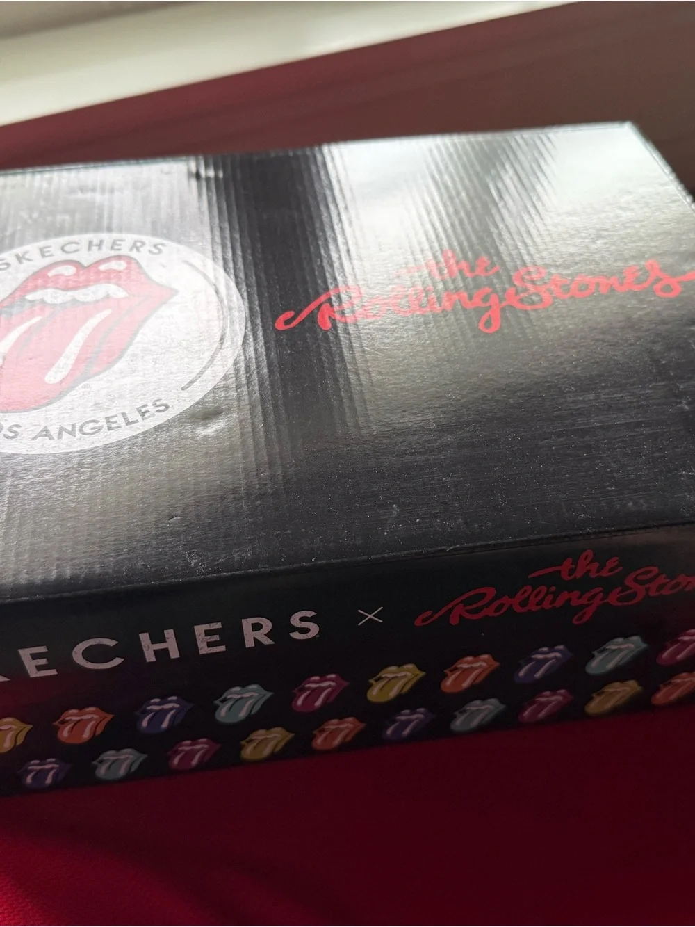 Skechers Black and White Rolling Stones Logo Sneakers